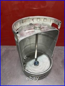Unique urinals made from beer kegs With Manual Flush