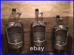 Unique urinals made from beer kegs perfect for bars, pubs, or themed venues