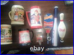 Vintage Budweiser keg tap handles and mugs