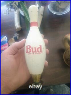 Vintage Budweiser keg tap handles and mugs