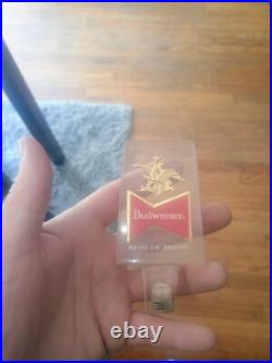 Vintage Budweiser keg tap handles and mugs