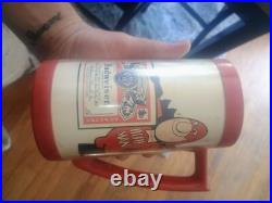 Vintage Budweiser keg tap handles and mugs